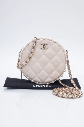 CHANEL Cream Calfskin Quilted Pearl Round Crossbody Bag
