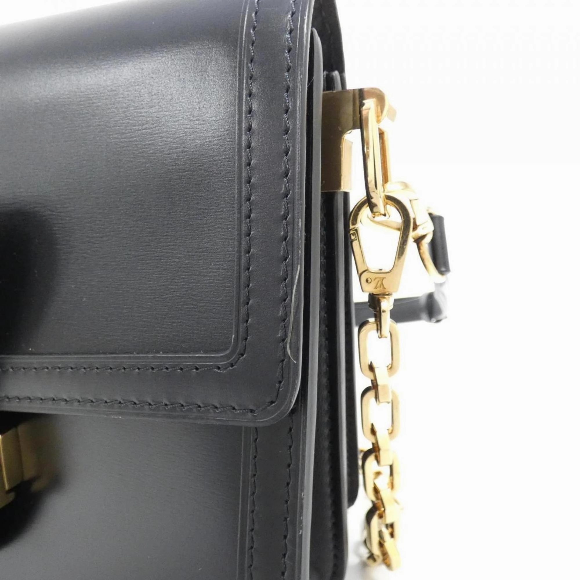 Elegant Leather Dauphine Shoulder Bag with Dust Bag and Strap