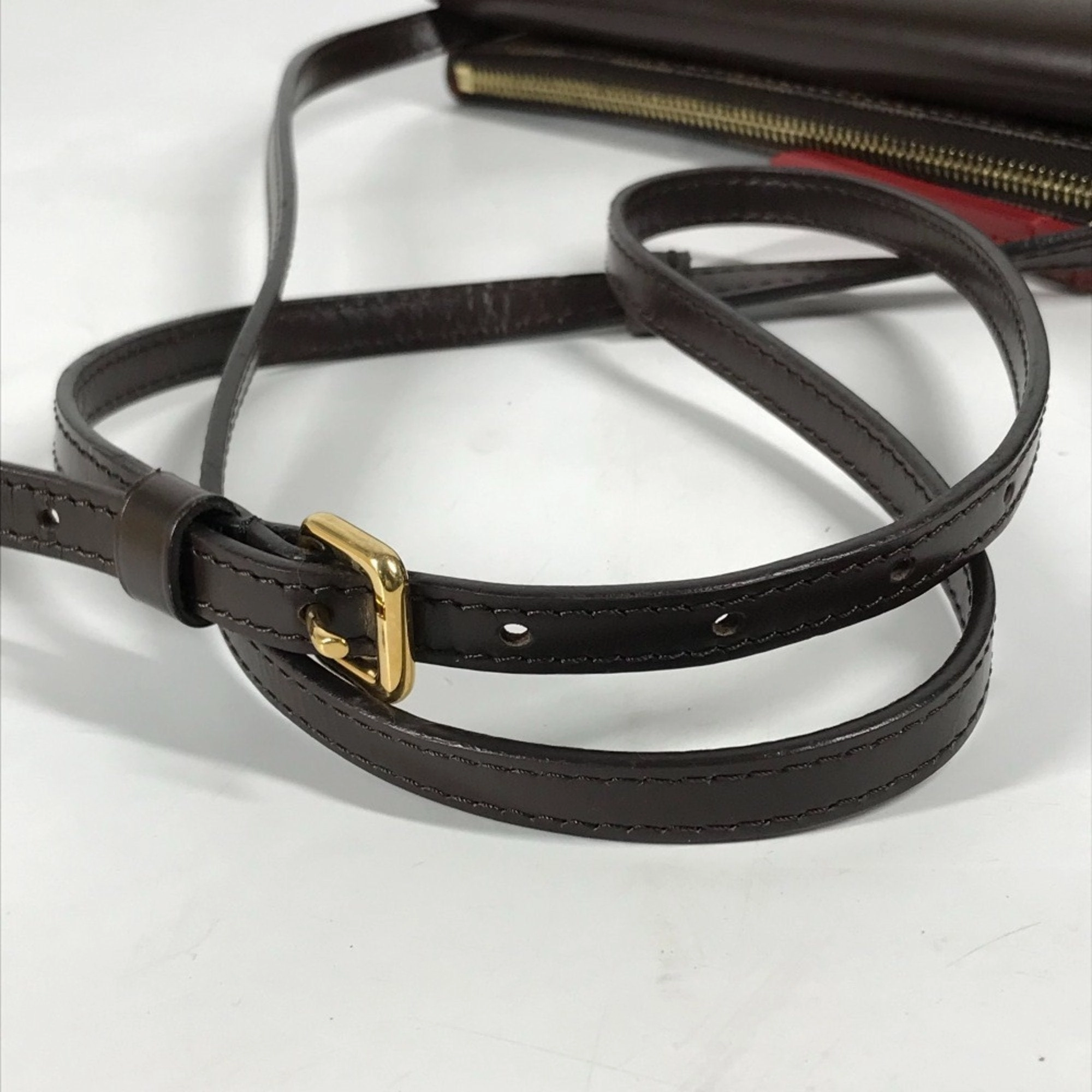 Pochette M95046 Crossbody Bag