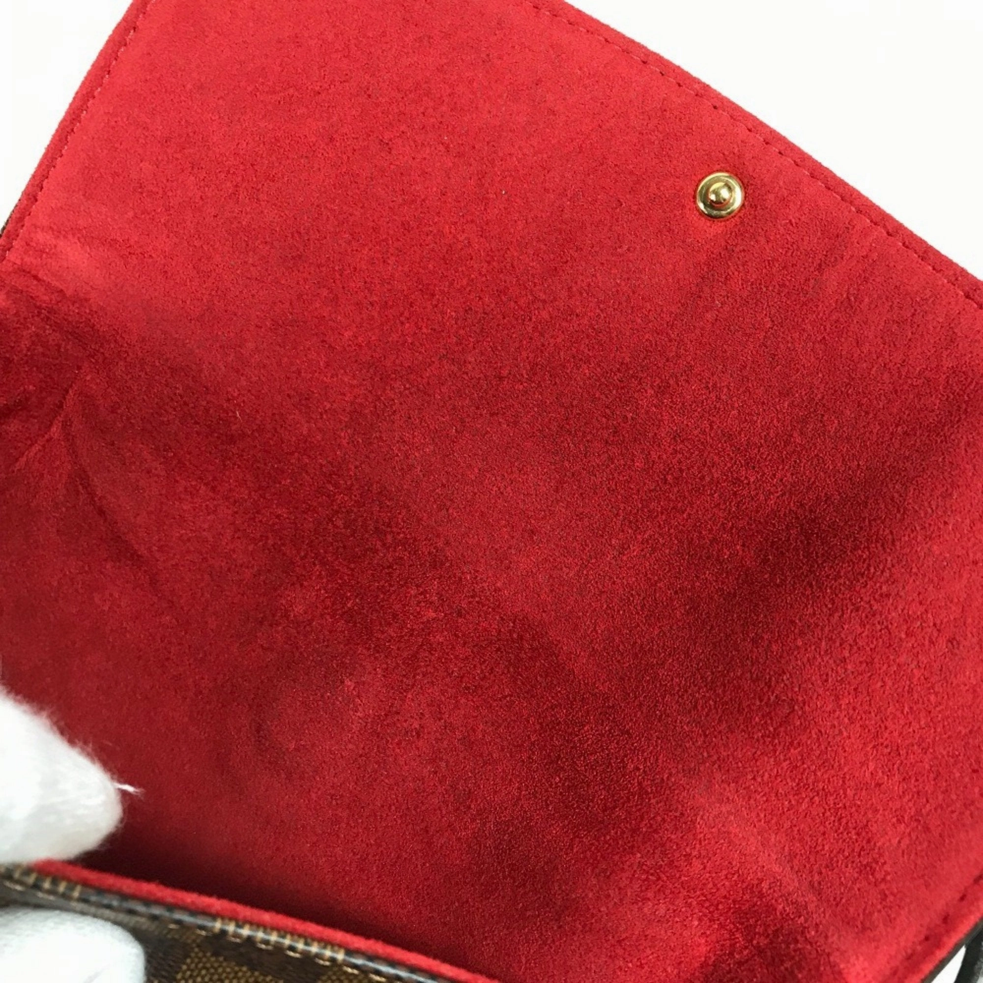 Pochette M95046 Crossbody Bag