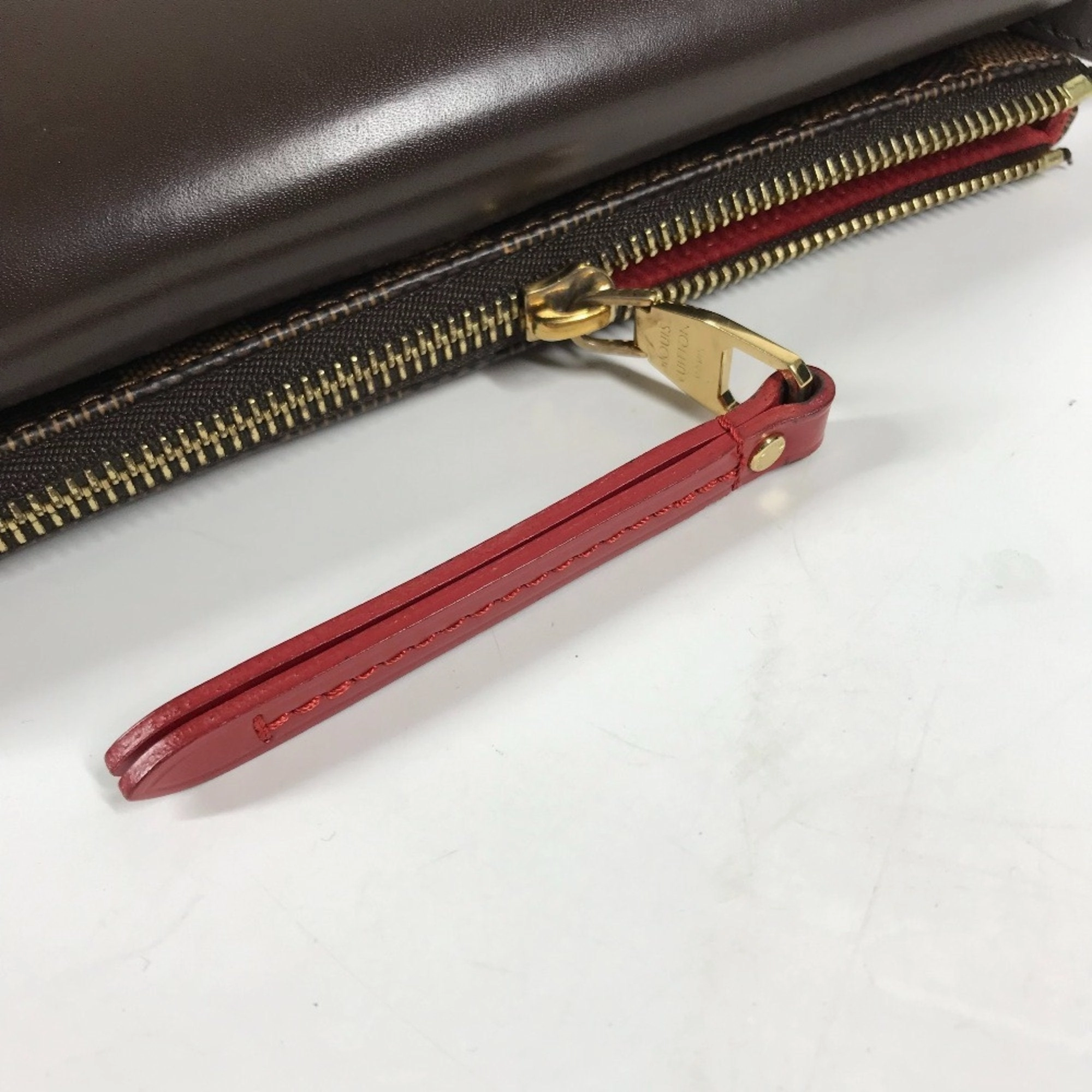 Pochette M95046 Crossbody Bag