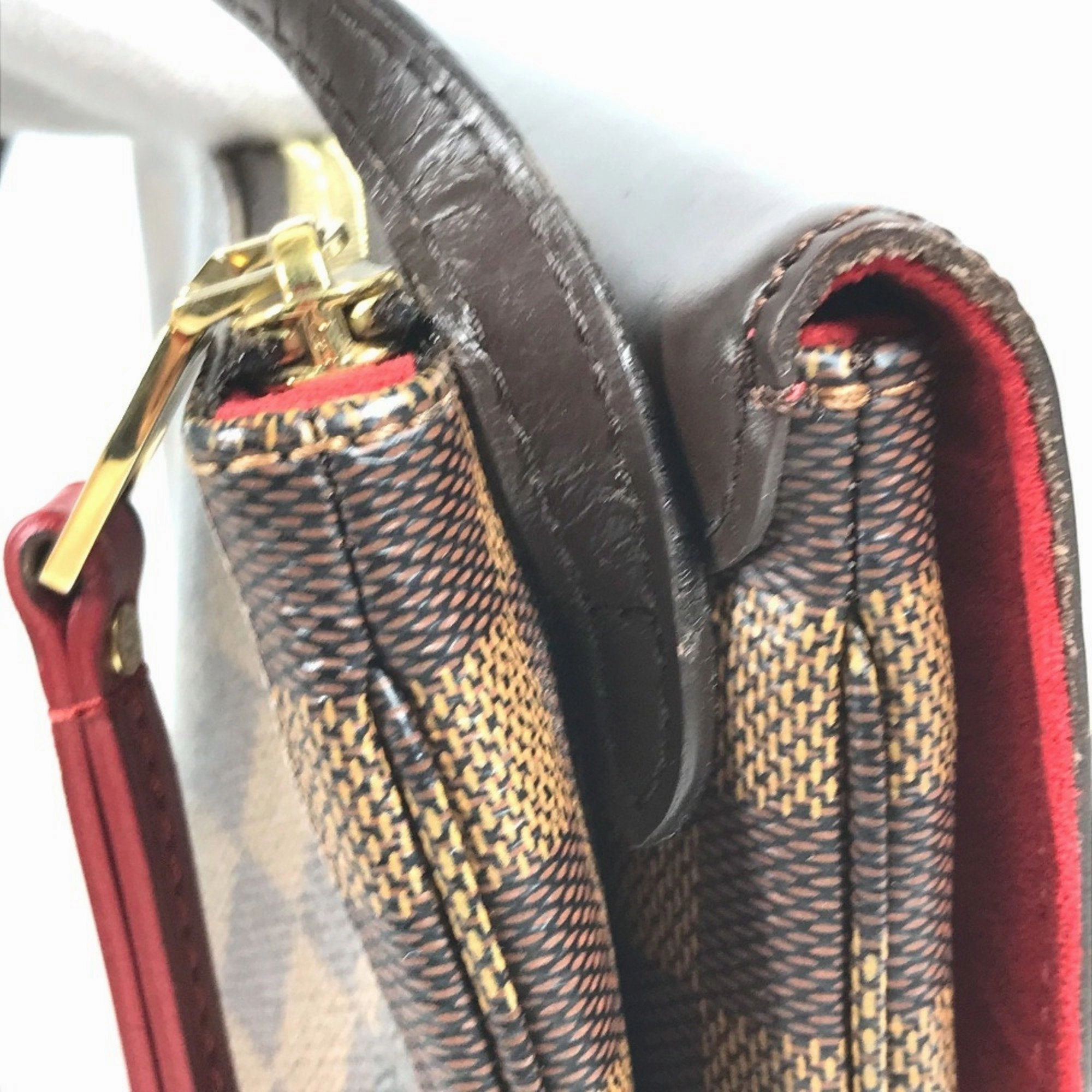 Pochette M95046 Crossbody Bag