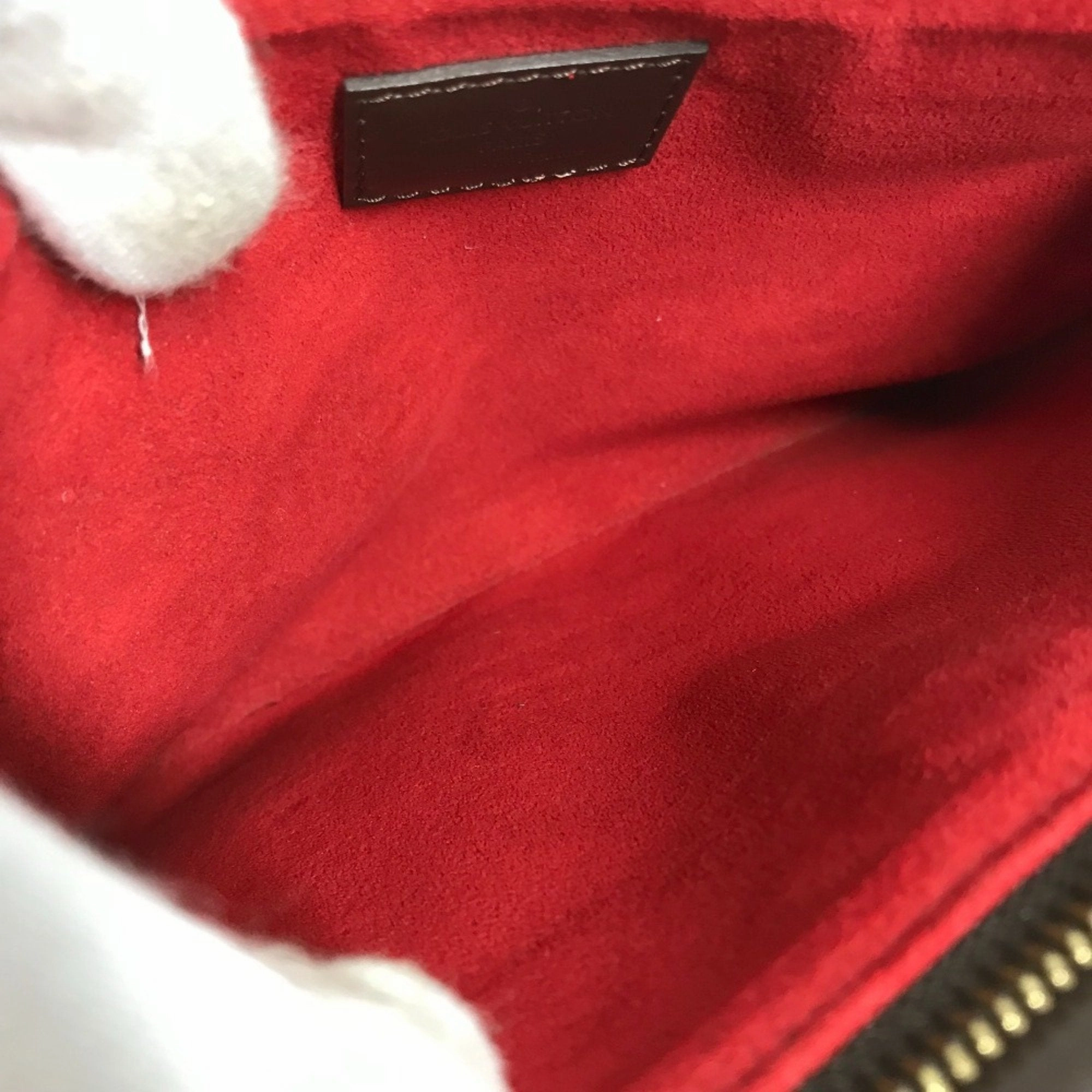 Pochette M95046 Crossbody Bag