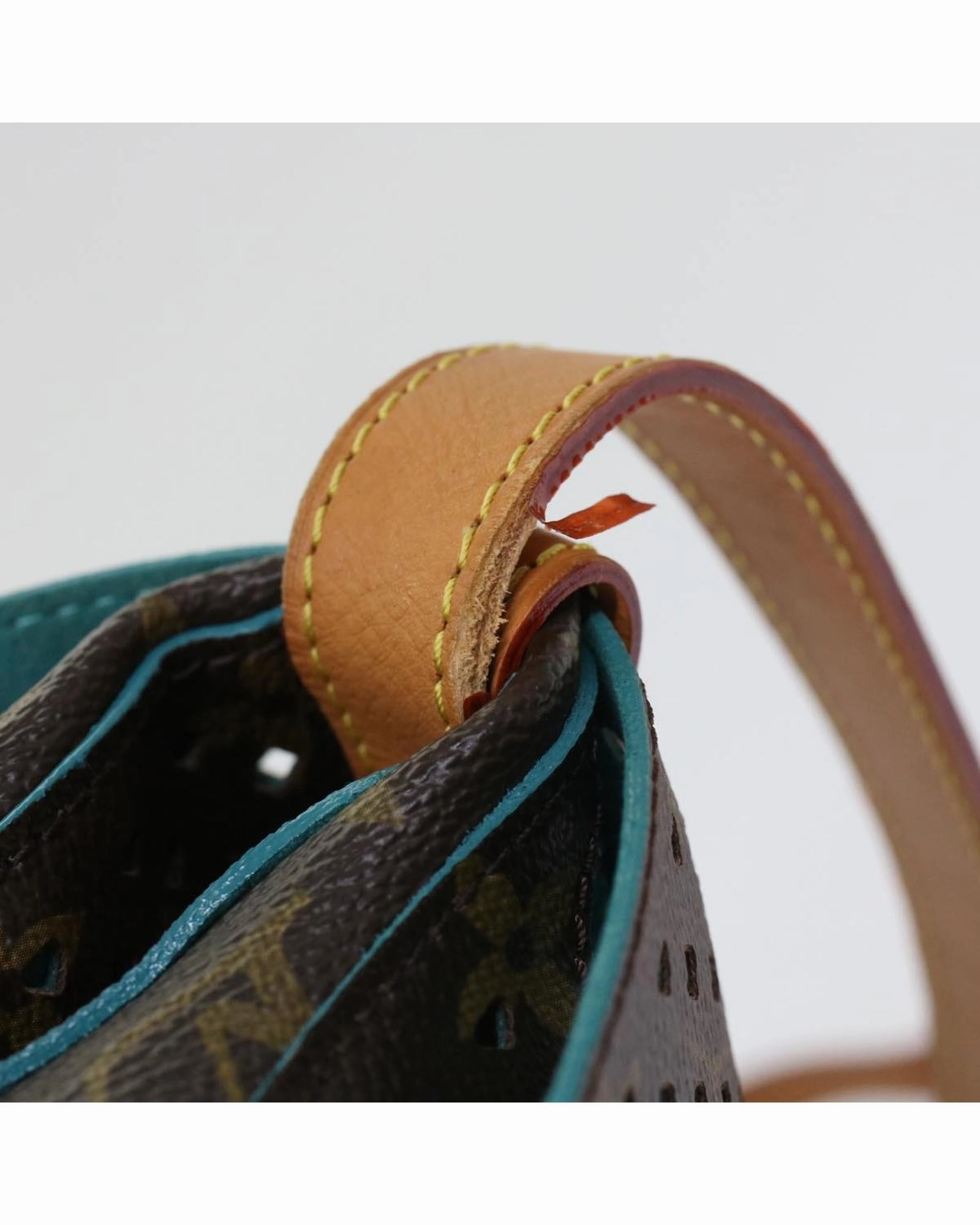 Pochette Perforated Crossbody Bag