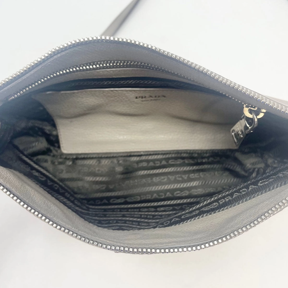 Prada Enameled Metal Triangle Crossbody