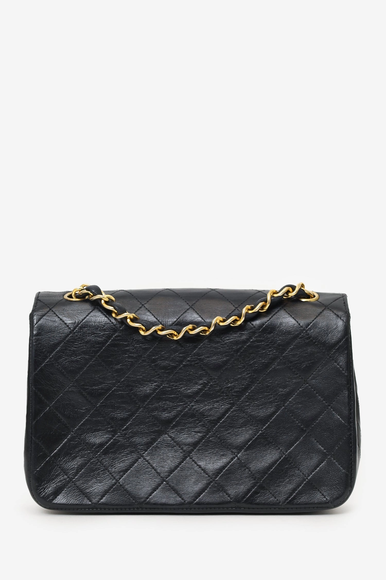 Pre-Loved Chanel 1986-88 Black Quilted Lambskin Circle CC Mini Flap Bag
