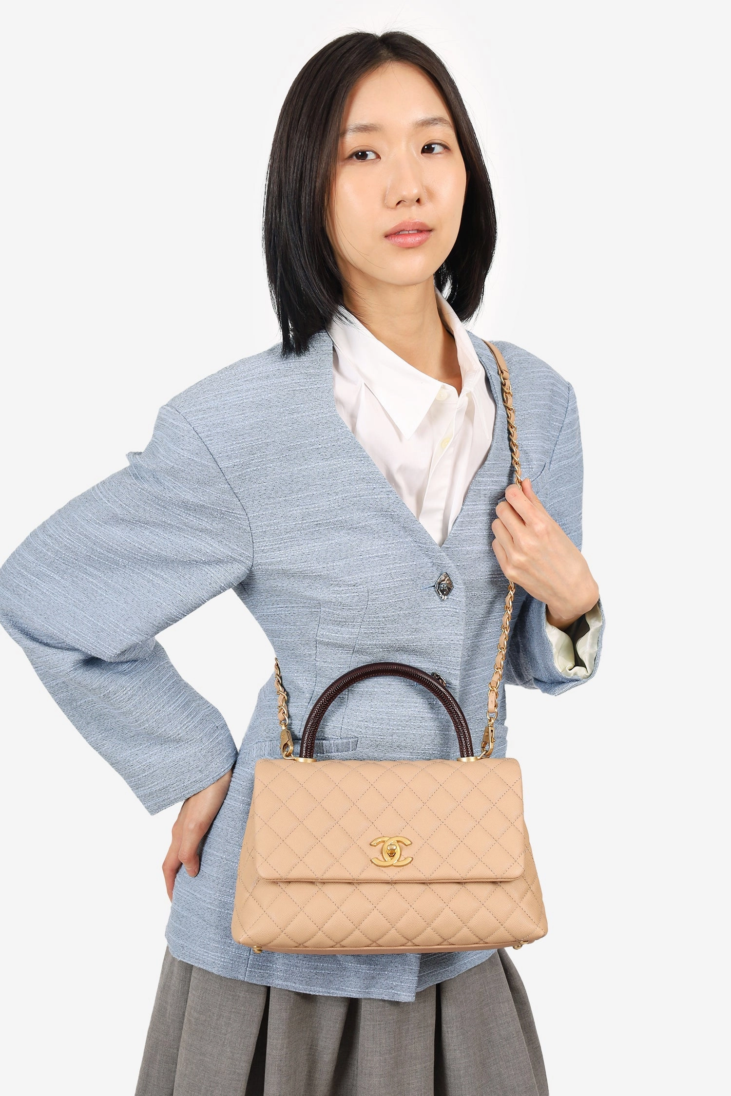 Pre-Loved Chanel 2019-20 Beige Caviar Leather Small Coco Handle with Strap